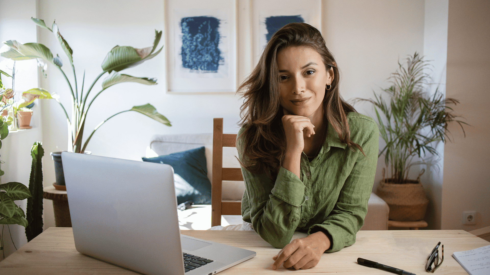Remote employee at a home office with a laptop